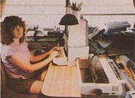 Sara works on her solar novel (solar-powered, that is!). Photovoltaic panels provide the current that runs her Apple computer.